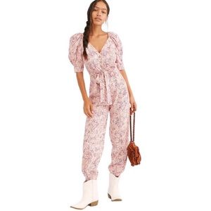 Free People “On a Quest” jumpsuit in size 0.